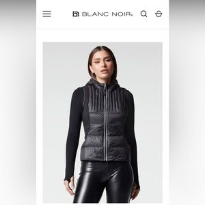 Blanc Noir Vest. Brand new. Tag is still on. Size Small. Black w/ reflective.